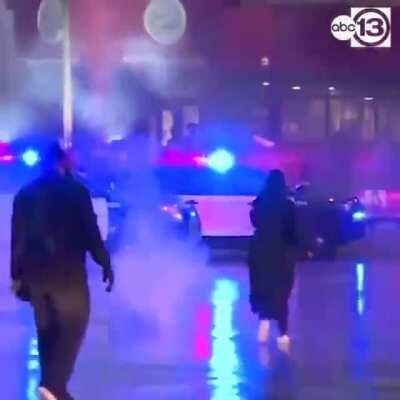 Minneapolis girl throwing tear gas grenade back at police