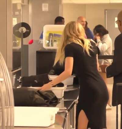 Dakota Fanning at the security checkpoint. Who would like to fuck that ass and fill her backdoor with cum?