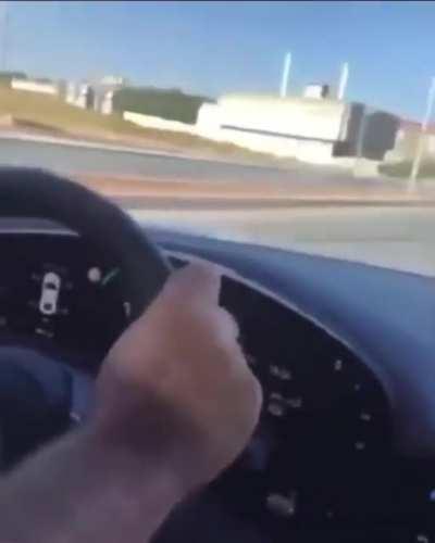 Going 200 kph towards a roundabout