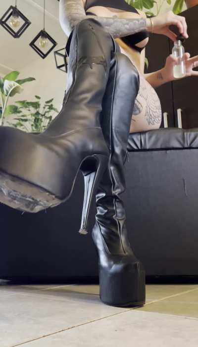 a little oil on my leather boots, I know it's starting to make your cock hard...
