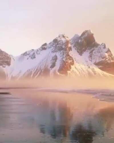 Icy mountains bordering the beach