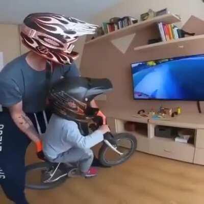 [Credit to u/ADarkcid] This dad giving the ultimate mountain biking experience to his son from home
