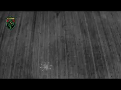 Video of an Aerorozvidka R18 UAV dropping munitions on a Russian BMP - View is from another spotter/chase UAV