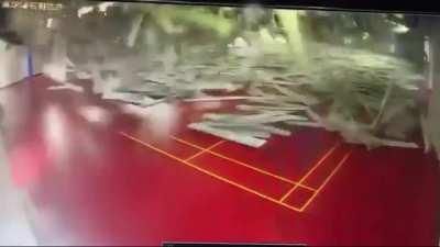 The roof of a school gym collapsed during an earthquake in Taiwan. A couple of kids with minor injuries
