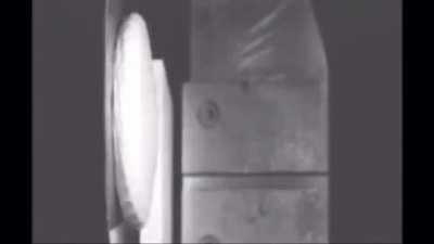 Golf ball hitting a metal plate at 10,000 Frames Per second.