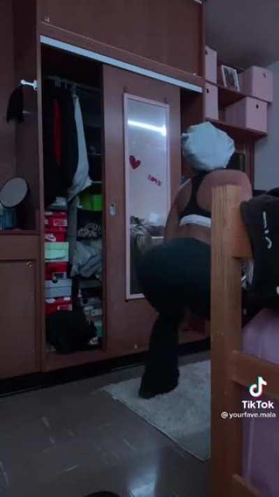 Playing around in her dorm