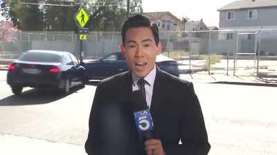 TV news crew is doing a story about a dangerous intersection and an accident happens in perfect view