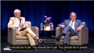 A day after Mike Prysner confronted George Bush, another protestor questions him about his war crimes.