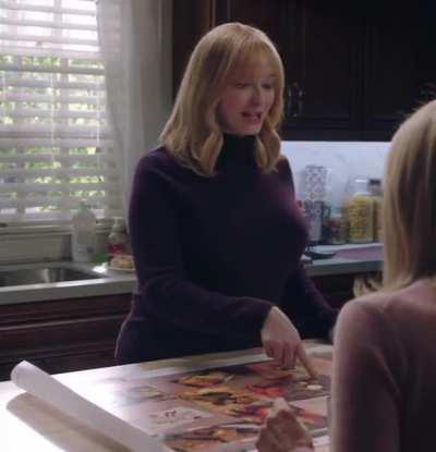 Purple sweater talking