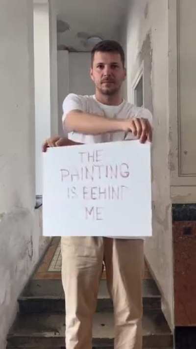 Artist showing his Art