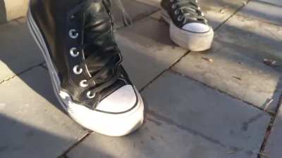 Girls crush snails with converse