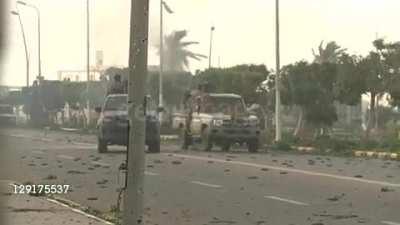 Rebel is down but not out, RPGs with telescopic sights, ZSU shreds a tree, and big ZSU recoil on a small pickup. (Libya 2011, rebel side)