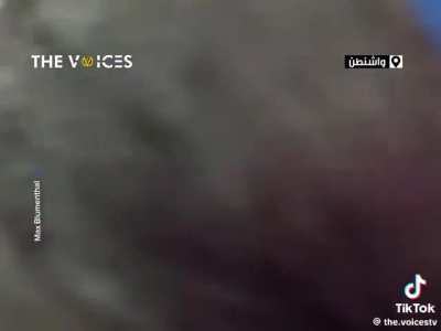 Journalist Max Blumenthal challenges conference speakers on genocide