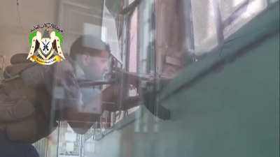 Southern Front FSA fighters use a sledgehammer to break down a wall and flank SAA positions, Qaboun Neighborhood - Damascus, July 2013