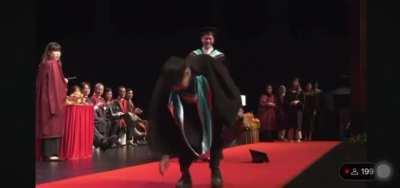 Fail Flip on Graduation Stage