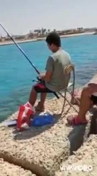 His first time fishing