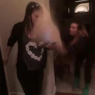 Hitting them with a pillow