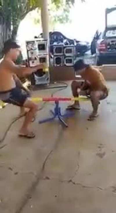 Drinking while on a seesaw is never a good idea