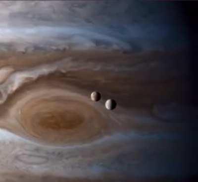 Timelapse of Europa and lo orbiting Jupiter captured by Cassini probe