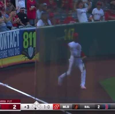 Jo Adell goes full extension to snag a liner.