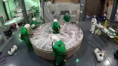 The processes of cleaning a 3.5 m diameter mirror for a ground based telescope used by the Department of Defence to track orbital satellites