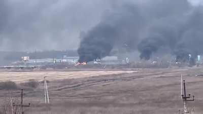 Previously unseen footage of a Russian SOBR Spetsnaz armored column covered by Ukrainian artillery while crossing a bridge at Irpin - February 25, 2022