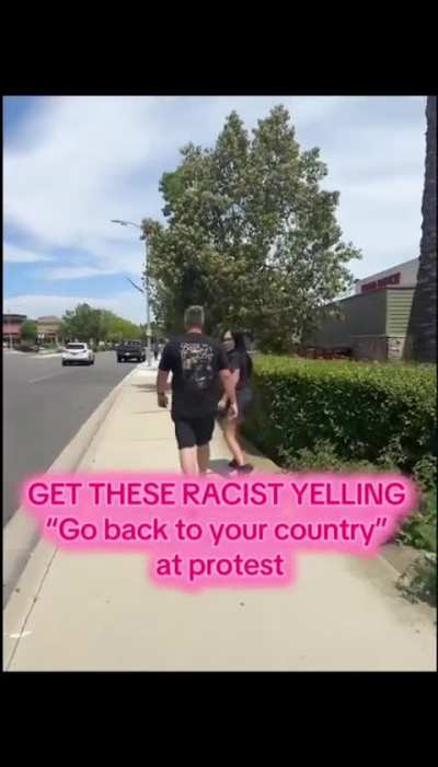 Woman harassing protesters telling them to go back to their country