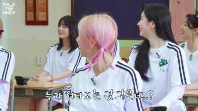 Who was peering through the window?