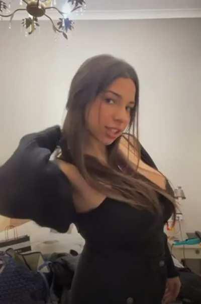 Showing Off Her Huge Tits