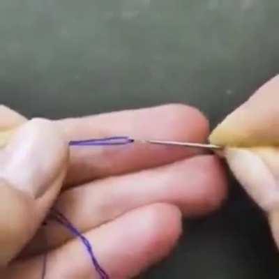 Threading a needle with magic