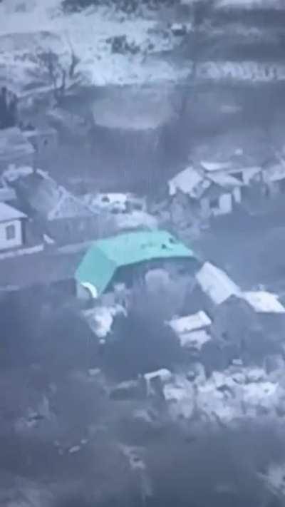 Ukrainian drone recording a tochka-U missile strike on Russian soldiers hiding in a building