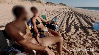 Getting a handjob by my stunning wife on the beach!