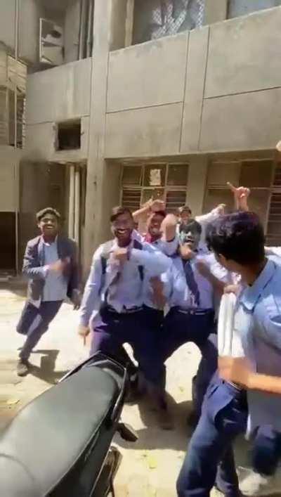 That's how you dance with the boys (yes, hes dancing with a dustbin)