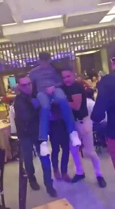 Needed a little help claiming his prize.