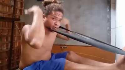 Exercising with elastic band around the neck