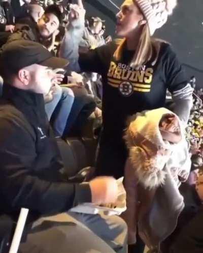 A Karen has a very public meltdown at an ice hockey game