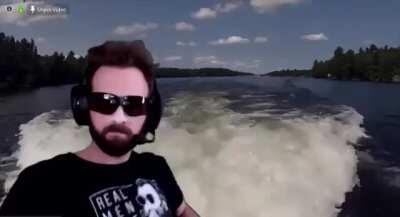 The one hand on the outboard motor control really sells this for me.