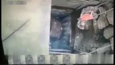 Worker is crushed in rock crusher (2 angles)