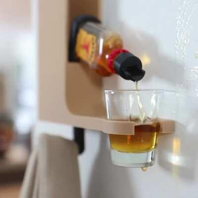 I design dumb product ideas so I built a coat hook that also pours you a shot.