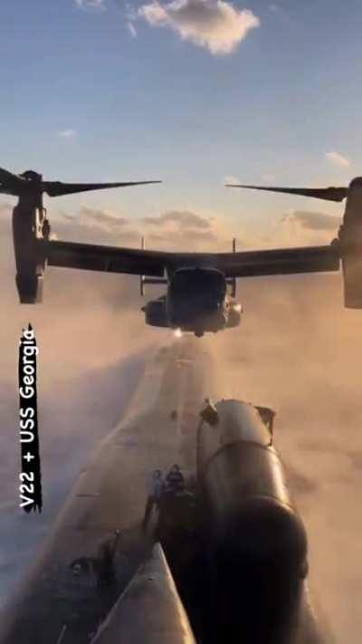 Ohio class USS Georgia (SSGN-729) & a hovering V-22 Osprey
