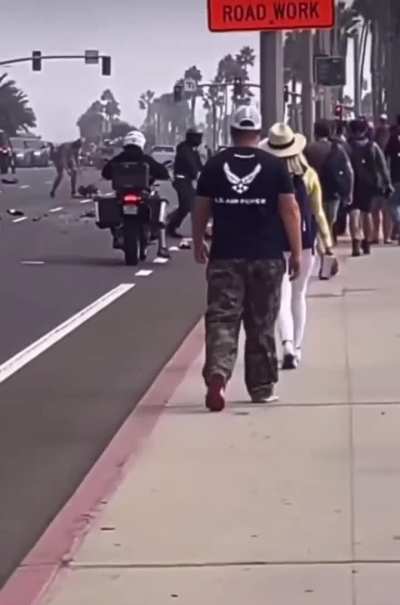 Motorcycle crashes into the back of a Honda on the  PCH in HB (today 10/05/2024)