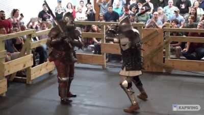 Brutal armored combat axe fight