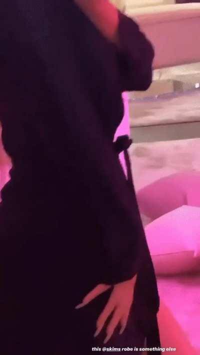 wearing a skims robe