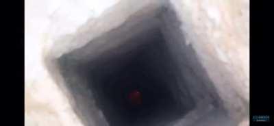 Throwing a molotov down a hole...