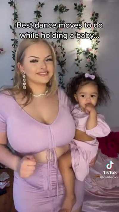 She is gonna give that child brain damage with that tiddy