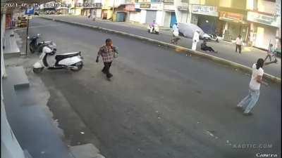 Quick Karma For Rickshaw Driver Attempting to Kick Dog