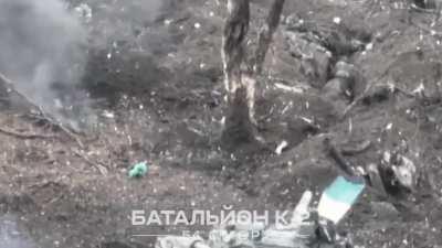 Ukrainian tank destroying people in a trench at close range