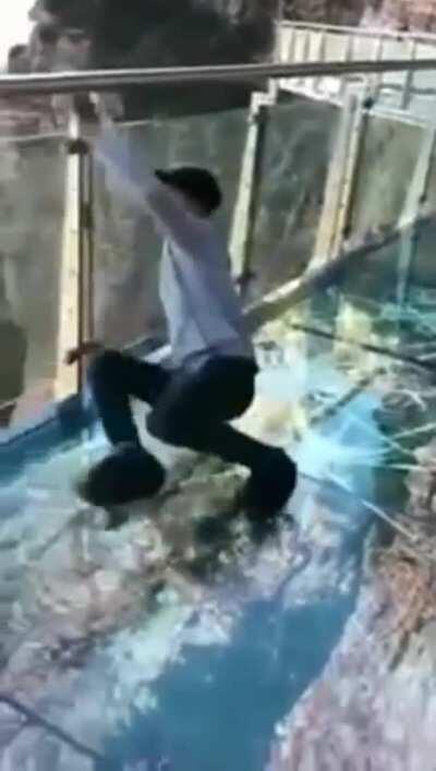 Glass walkway with special effect that appears to crack under weight