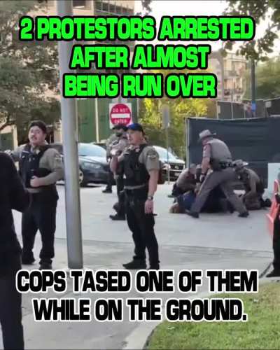 A young man protesting Police Brutality is assaulted by the police and tazed while handcuffed on the ground.