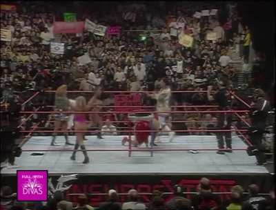 Terri vs The Kat in an arm wrestling contest (2000)